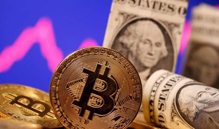 عملة( بيتكوين) تتخطى عتبة الـ60 ألف دولار