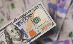 استقرار الدولار الأمريكي بفضل رفع أسعار الفائدة